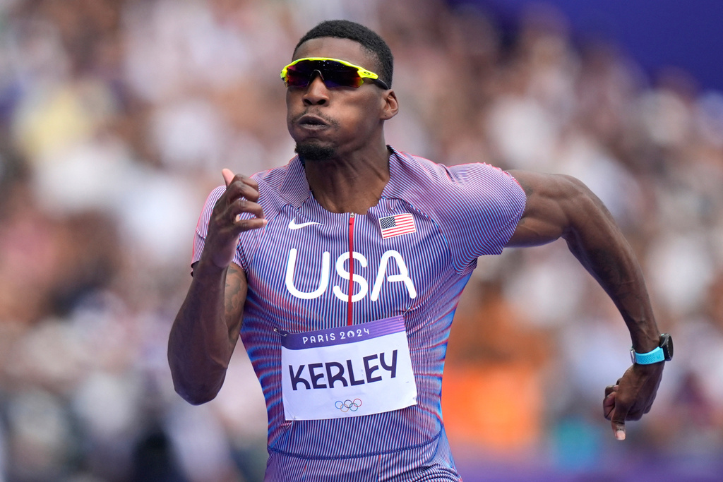 FILE - Fred Kerley, of the United States, competes in the men's 100-meter heats at the 2024 Summer Olympics, Saturday, Aug. 3, 2024, in Saint-Denis, France. (AP Photo/Matthias Schrader, File)