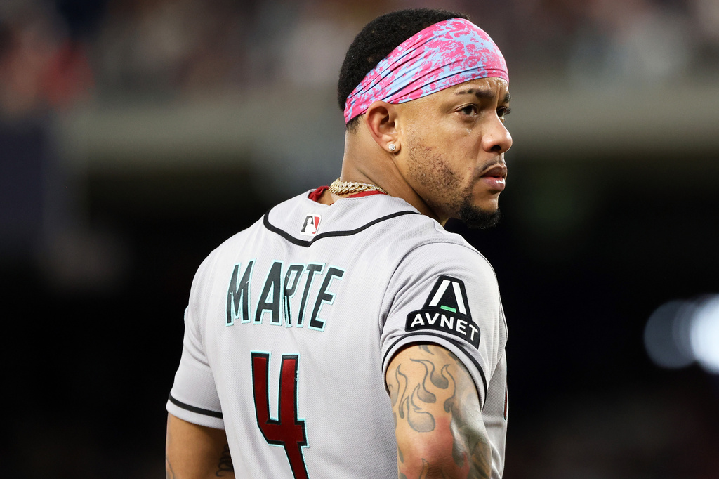 Arizona Diamondbacks' Ketel Marte looks on during the seventh inning of a baseball game against the Washington Nationals, Friday, July 24, 2026, in Washington. (AP Photo/Daniel Kucin Jr.)