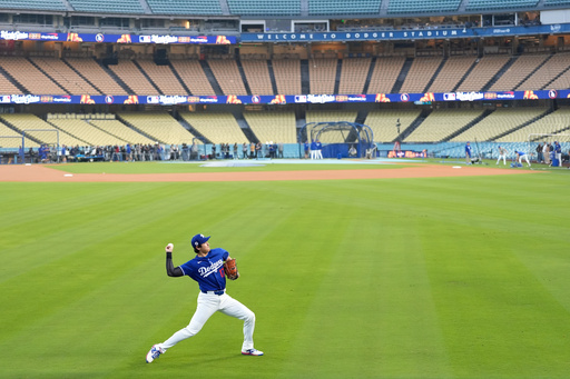 Los Angeles Dodgers' Shohei Ohtani works out ahead of Game 3 of the 2025 World Series against the Toronto Blue Jays in Los Angeles, Sunday, Oct. 26, 2025. (AP Photo/Ashley Landis) Los Angeles Dodgers' Shohei Ohtani works out ahead of Game 3 of the 2025 World Series against the Toronto Blue Jays in Los Angeles, Sunday, Oct. 26, 2025. (AP Photo/Ashley Landis)