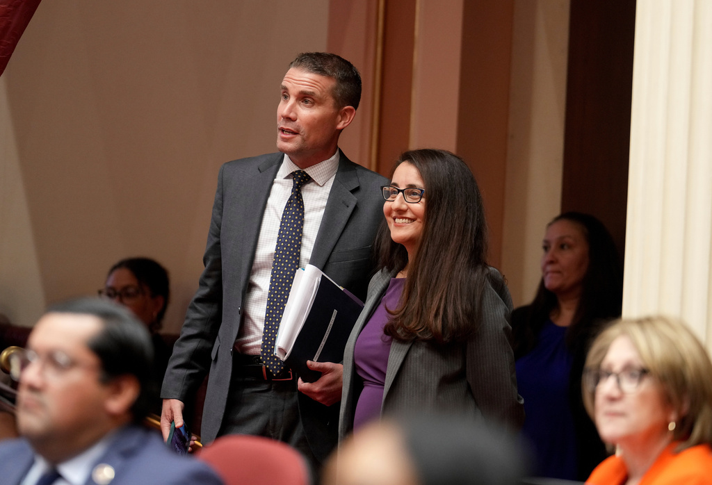 State Senate President Pro Tempore Mike McGuire and Democratic state Sen. Monique Limon watch as the votes are counted on a bill before the Senate at the Capitol, in Sacramento, Calif., Thursday, Sept. 11, 2025. (AP Photo/Rich Pedroncelli)