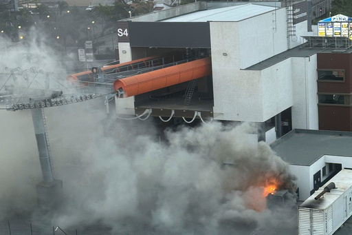 Protesters set fire to a newly built cable car station, which only operates for three hours a day, powered by a generator due to a lack of electricity in the capital, in Antananarivo, Madagascar, Thursday, Sept. 25, 2025. (AP Photo/Sarah Tetaud) Protesters set fire to a newly built cable car station, which only operates for three hours a day, powered by a generator due to a lack of electricity in the capital, in Antananarivo, Madagascar, Thursday, Sept. 25, 2025. (AP Photo/Sarah Tetaud)
