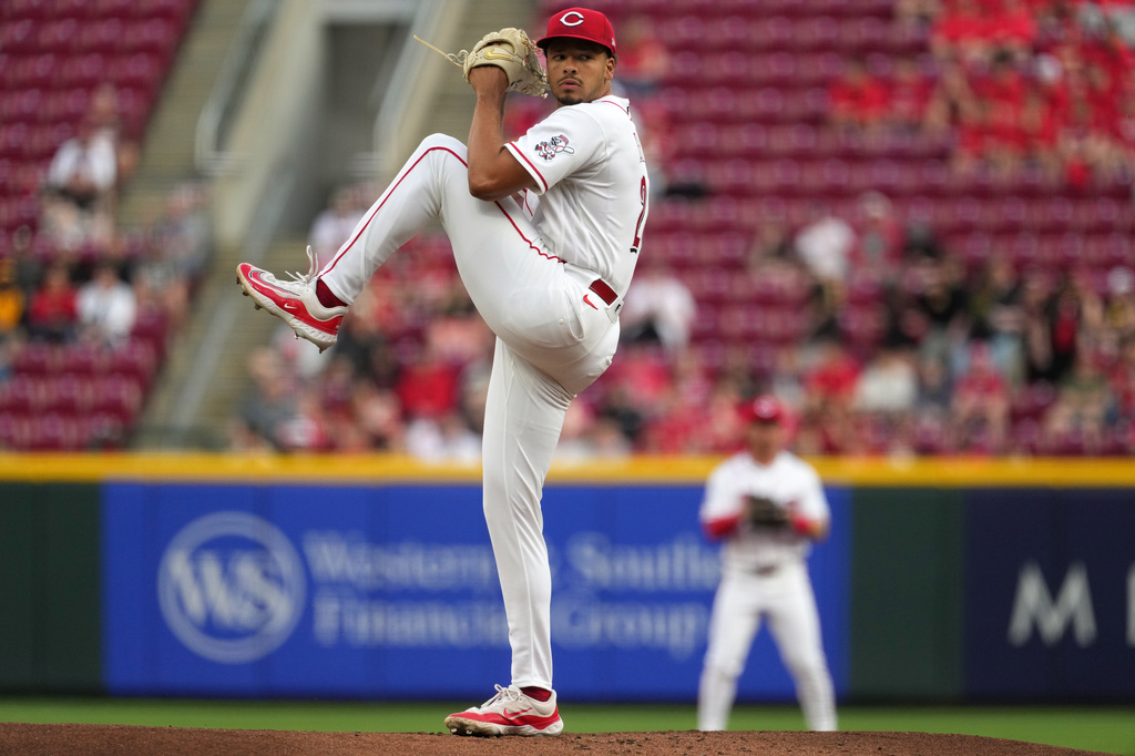 Cincinnati Reds pitcher Chase Burns delivers a pitch during the first inning of a baseball game against the Pittsburgh Pirates, Monday, March 30, 2026, in Cincinnati. (AP Photo/Kareem Elgazzar)