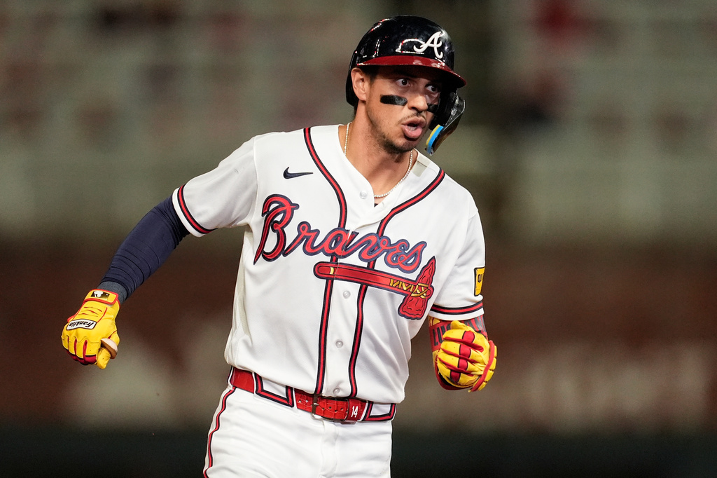 Atlanta Braves' Mauricio Dubón celebrates his two-run home run against the Chicago Cubs in the eighth inning of a baseball game, Wednesday, May 13, 2026, in Atlanta. (AP Photo/Mike Stewart)