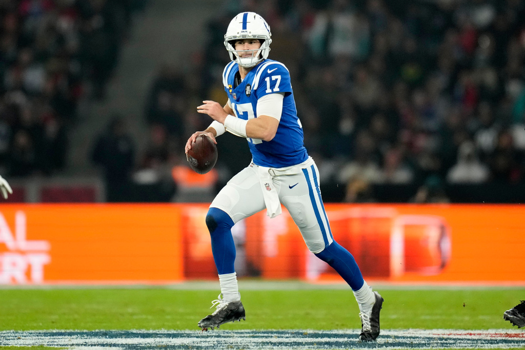 Indianapolis Colts quarterback Daniel Jones looks to pass during the first half of an NFL football game against the Atlanta Falcons, Sunday, Nov. 9, 2025, in Berlin, Germany. (AP Photo/Ebrahim Noorozi)