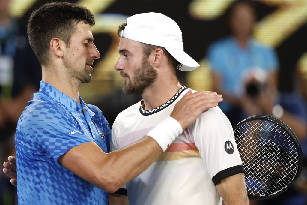 FILE - Novak Djokovic, left, of Serbia is congratulated by Tommy Paul of the U.S. after their semifinal at the Australian Open tennis championship in Melbourne, Australia, Jan. 27, 2023. (AP Photo/Asanka Brendon Ratnayake, file)