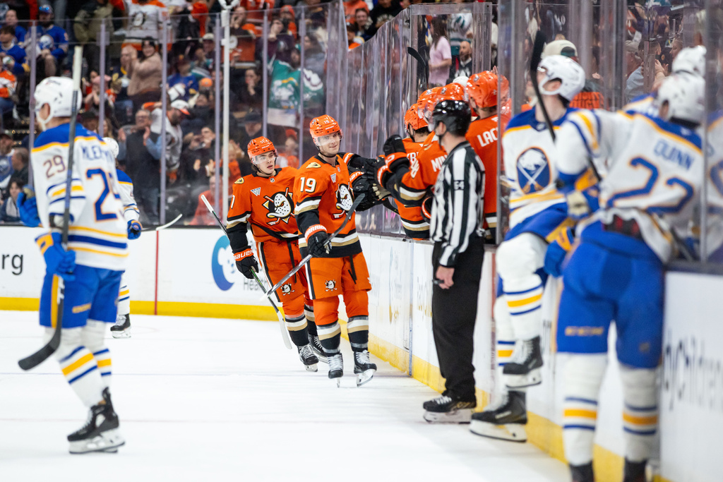 Anaheim Ducks right wing Troy Terry (19) celebrates after scoring against the Buffalo Sabres during the second period of an NHL hockey game, Sunday, March 22, 2026, in Anaheim, Calif. (AP Photo/Ethan Swope)