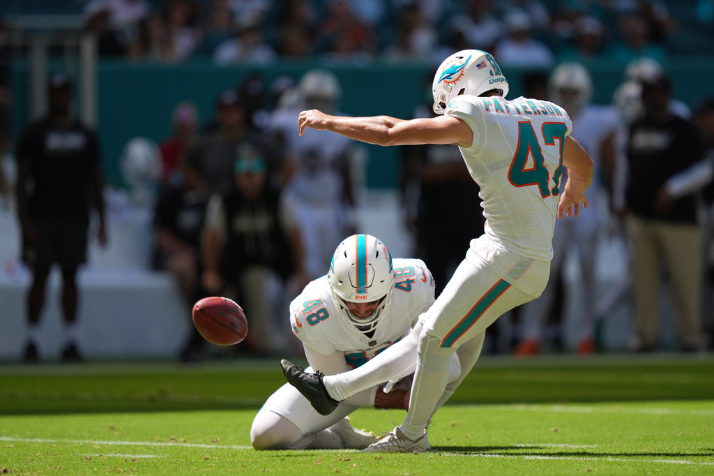 Miami Dolphins kicker Riley Patterson (47) kicks an extra point during the first half of an NFL football game against the Cincinnati Bengals in Miami Gardens, Fla., Sunday, Oct. 11, 2026. (AP Photo/Rebecca Blackwell)