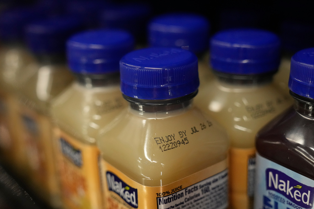 An Enjoy By date is stamped on a drink displayed at Park Plaza Fine Foods, Tuesday, June 30, 2026, in San Francisco. (AP Photo/Jeff Chiu)