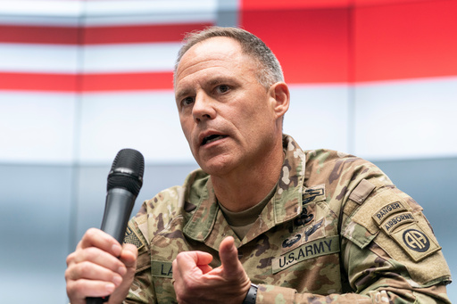 FILE - U.S. Army Maj. Gen. Christopher LaNeve, Commanding General, 82nd Airborne Division, speaks with reporters, April 24, 2022, in Poland near the Ukraine border. (AP Photo/Alex Brandon, Pool) FILE - U.S. Army Maj. Gen. Christopher LaNeve, Commanding General, 82nd Airborne Division, speaks with reporters, April 24, 2022, in Poland near the Ukraine border. (AP Photo/Alex Brandon, Pool)