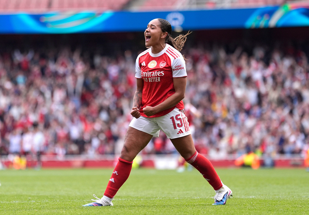 Arsenal's Olivia Smith celebrates scoring her side's second goal during the Women's Champions League semi-final, first leg soccer match between Arsenal and OL Lyonnes in London, England, Sunday, April 26, 2026. (Andrew Matthews/PA via AP)