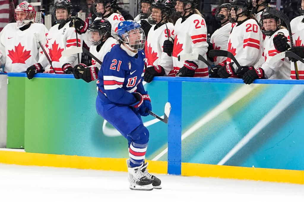 United States' Hilary Knight (21) celebrates after scoring her side's opening goal during a women's ice hockey gold medal game between the United States and Canada at the 2026 Winter Olympics, in Milan, Italy, Thursday, Feb. 19, 2026. (AP Photo/Hassan Ammar)