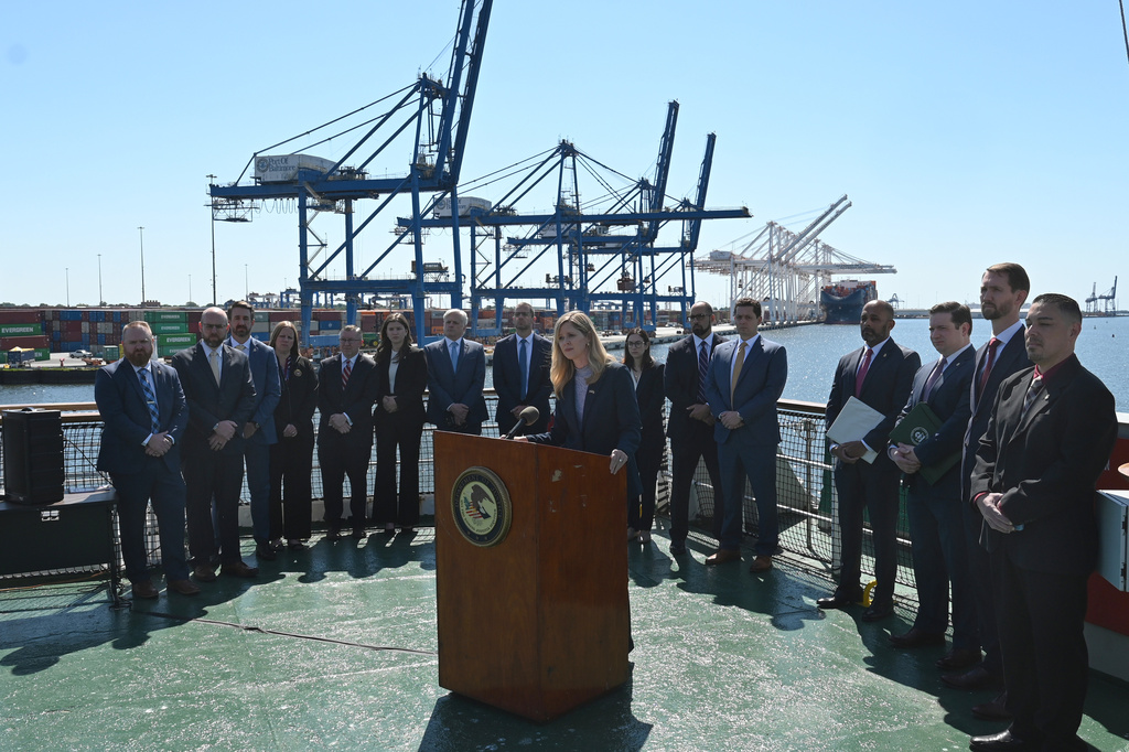 U.S. Attorney for the District of Maryland Kelly O. Hayes, center, updates reporters about the investigation of the Dali container vessel and Francis Scott Key Bridge during a news conference Tuesday, May 12, 2026 in Baltimore. (AP Photo/Gail Burton)