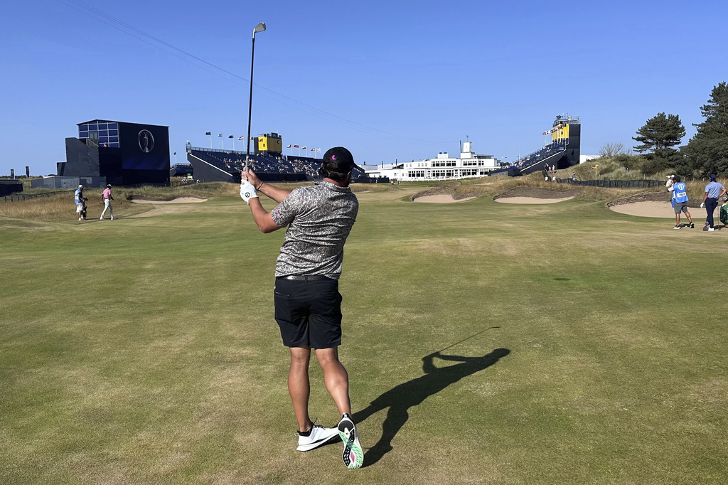 Peter Uihlein watches his 2-iron to the 18th green at Royal Birkdale on Sunday, July 12, 2026 in Southport, England, as he prepares for the British Open (AP Photo/Doug Ferguson)