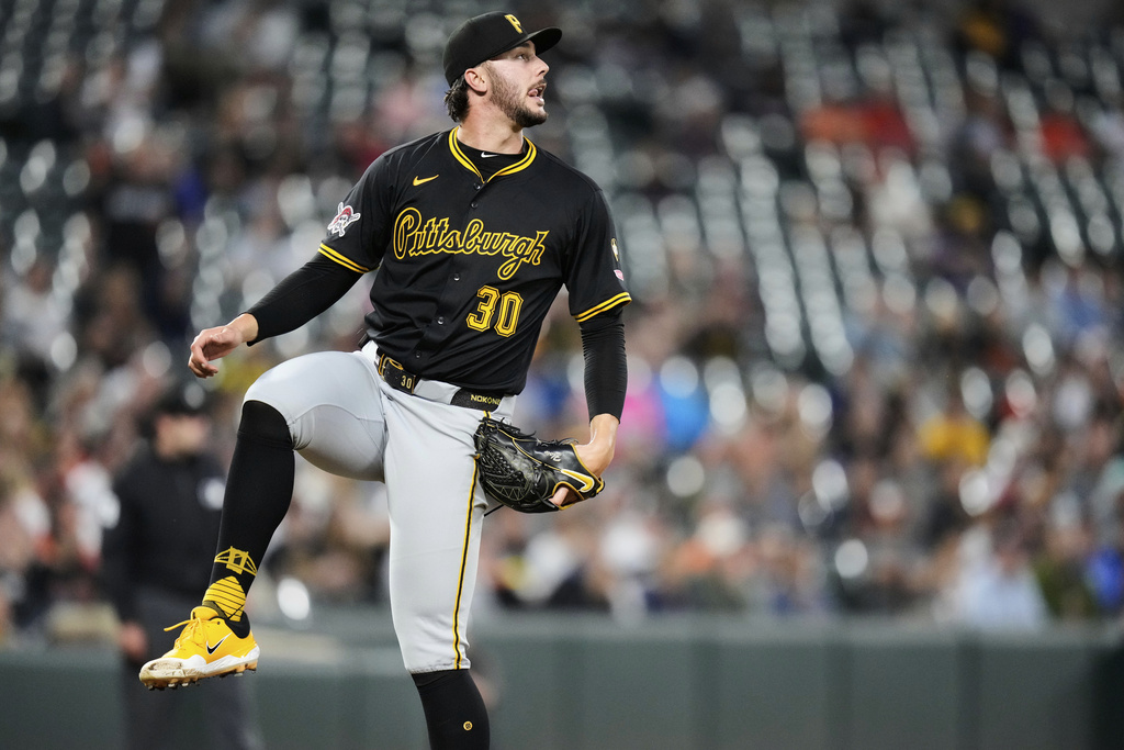 Pittsburgh Pirates starting pitcher Paul Skenes (30) watches as Baltimore Orioles' Dylan Beavers hits a double during the third inning of a baseball game, Wednesday, Sept. 10, 2025, in Baltimore. (AP Photo/Stephanie Scarbrough)