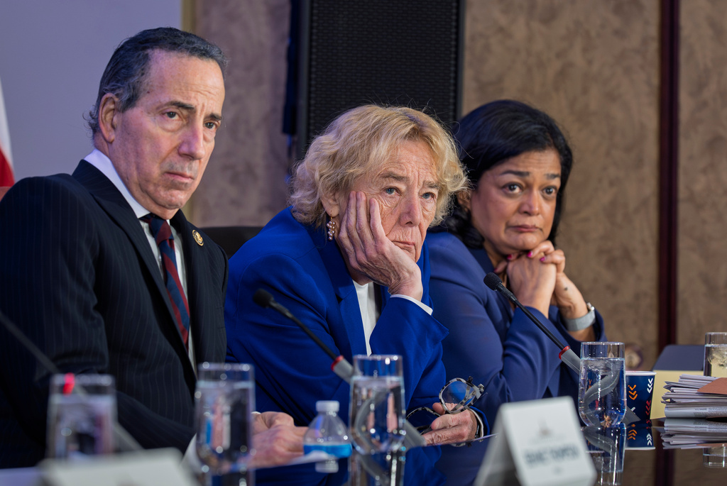 From left, Rep. Jamie Raskin, D-Md., Rep. Zoe Lofgren, D-Calif., and Rep. Pramila Jayapal, D-Wash., watch a video showing the storming of Capitol and the violent attack on Capitol Police officers as House Democrats hold an unofficial hearing on the 5th anniversary of the Jan. 6, 2021, riot by supporters of President Donald Trump, at the Capitol in Washington, Tuesday, Jan. 6, 2026. (AP Photo/J. Scott Applewhite)