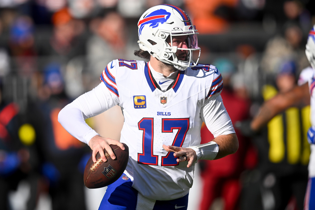 Buffalo Bills quarterback Josh Allen looks to throw against the Cleveland Browns during the first half of an NFL football game in Cleveland, Sunday, Dec. 21, 2025. (AP Photo/David Richard)