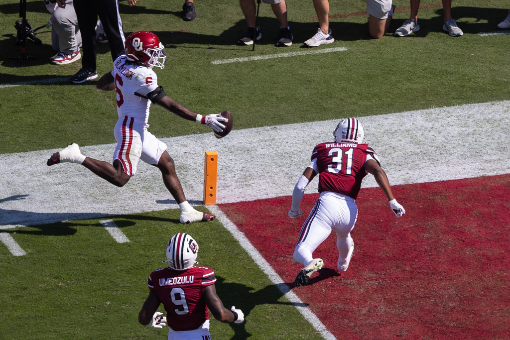 Oklahoma running back Tory Blaylock (6) runs in for a touchdown during the first half against South Carolina in an NCAA college football game, Saturday, Oct. 18, 2025, in Columbia, S.C. (AP Photo/Scott Kinser)