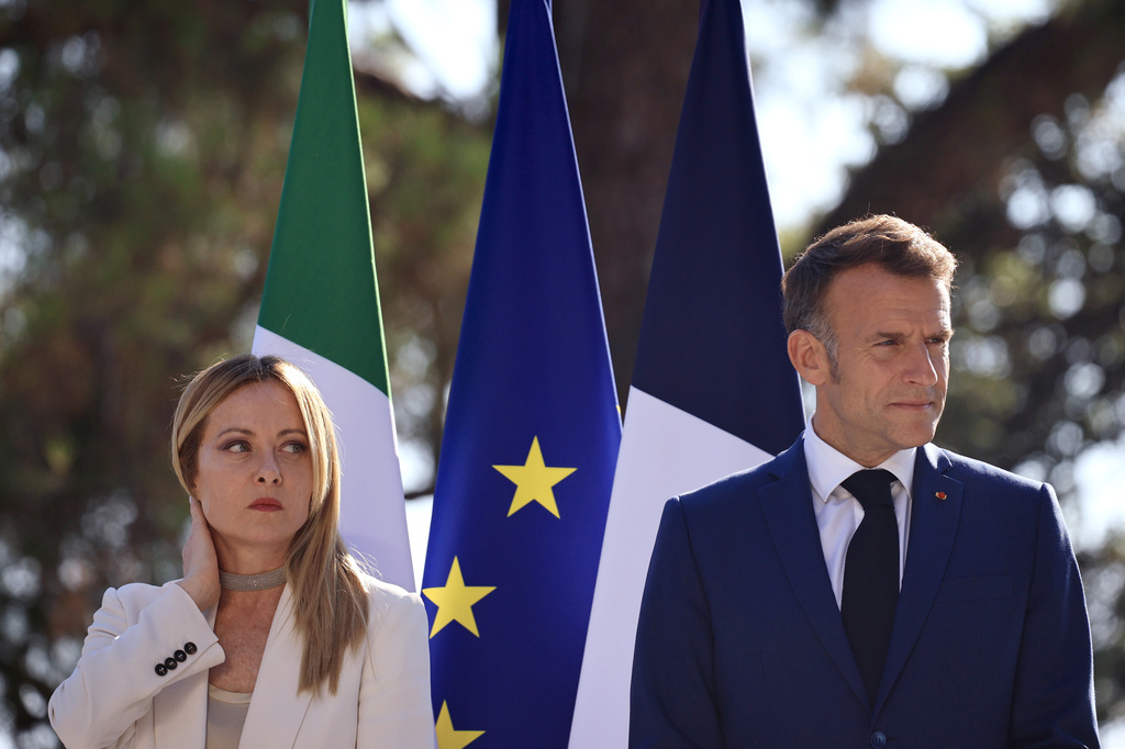 Italian Prime Minister Giorgia Meloni, left, attends a joint press conference with French President Emmanuel Macron, right, as part of a Franco-Italian summit in Antibes, southern France, Thursday, June 25, 2026. (Manon Cruz/Pool Photo via AP)