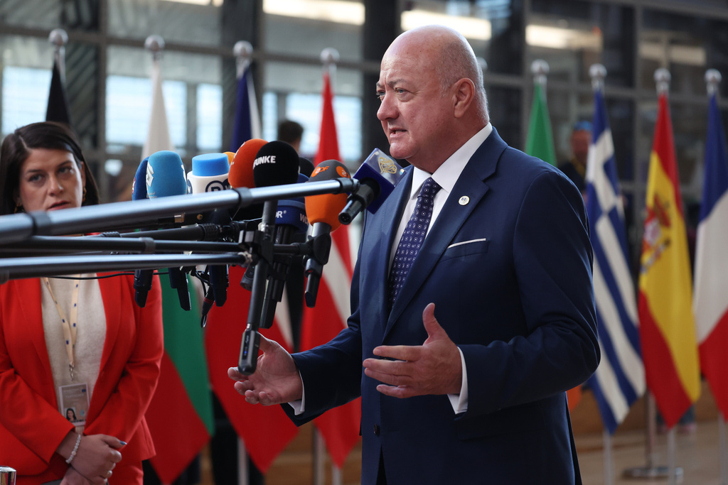 Austria's Chancellor Christian Stocker speaks with the media as he arrives for the EU summit at the European Council building in Brussels, Thursday, March 19, 2026. (AP Photo/Omar Havana)