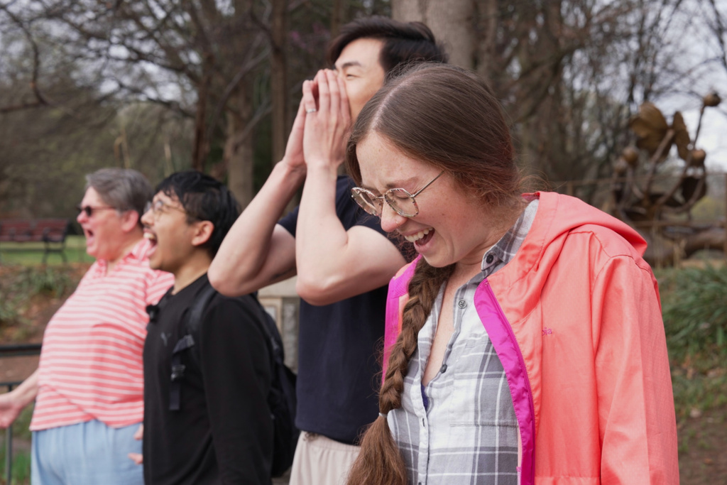 Sarah Woolson participates in a Scream Club meeting at Piedmont Park, Sunday, March 8, 2026, in Atlanta. (AP Photo/Emilie Megnien)