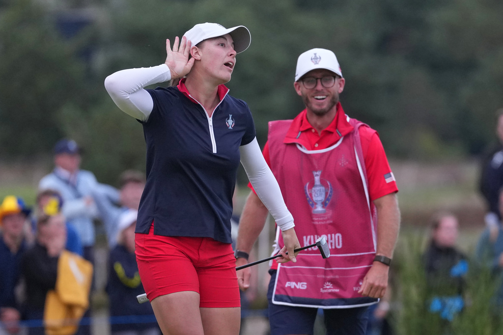Jennifer Kupcho of the United States celebrates after holing a putt on the 18th green during the Solheim Cup in Den Bosch, Netherlands, Saturday, Sept. 12, 2026. (AP Photo/Alastair Grant)