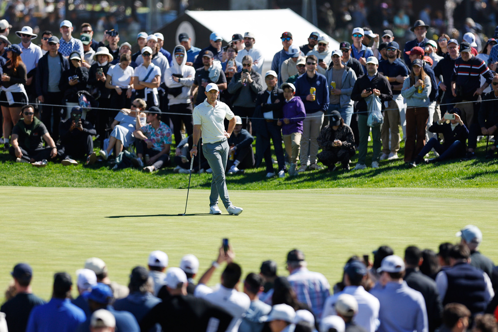 Rory McIlroy, from Northern Ireland, waits to putt on the third green during the third round of the Genesis Invitational golf tournament at Riviera Country Club, Saturday, Feb. 21, 2026, in the Pacific Palisades area of Los Angeles. (AP Photo/Caroline Brehman )