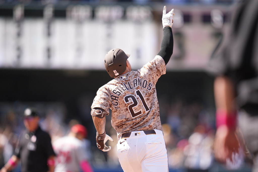 San Diego Padres' Nick Castellanos celebrates his two-run home run during the ninth inning of a baseball game against the St. Louis Cardinals Sunday, May 10, 2026, in San Diego. (AP Photo/Gregory Bull)
