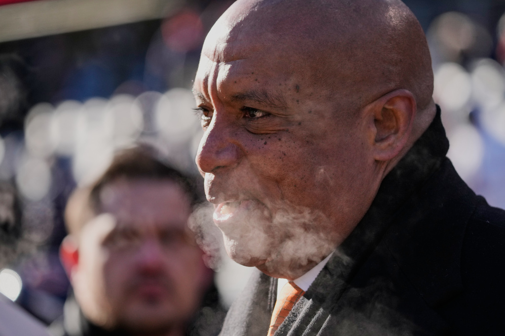 Kevin Warren, president and chief executive officer of the Chicago Bears, talks on the field before an NFL football game against the Cleveland Browns in Chicago, Sunday, Dec. 14, 2025. (AP Photo/Nam Y. Huh)