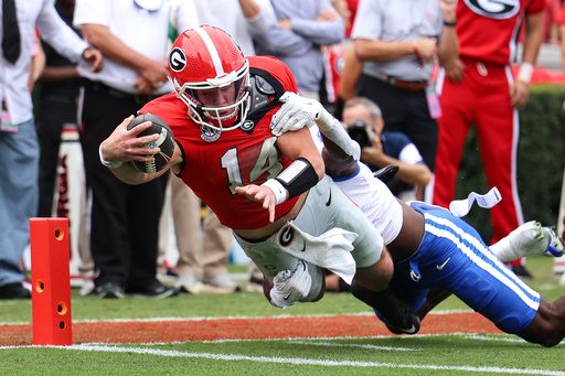 Georgia quarterback Gunner Stockton (14) dives in for a touchdown during the first half of an NCAA college football game against Kentucky, Saturday, Oct. 4, 2025, in Athens, Ga. (AP Photo/Colin Hubbard) Georgia quarterback Gunner Stockton (14) dives in for a touchdown during the first half of an NCAA college football game against Kentucky, Saturday, Oct. 4, 2025, in Athens, Ga. (AP Photo/Colin Hubbard)