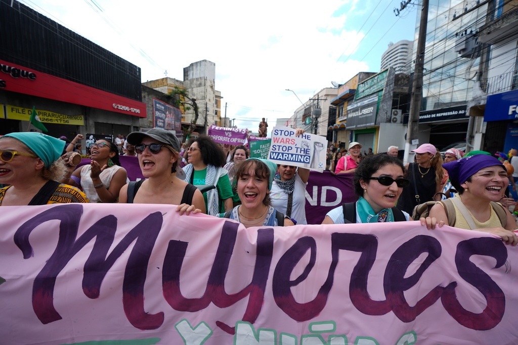 Activists participate in a climate protest during the COP30 U.N. Climate Summit, Saturday, Nov. 15, 2025, in Belem, Brazil. (AP Photo/Fernando Llano)