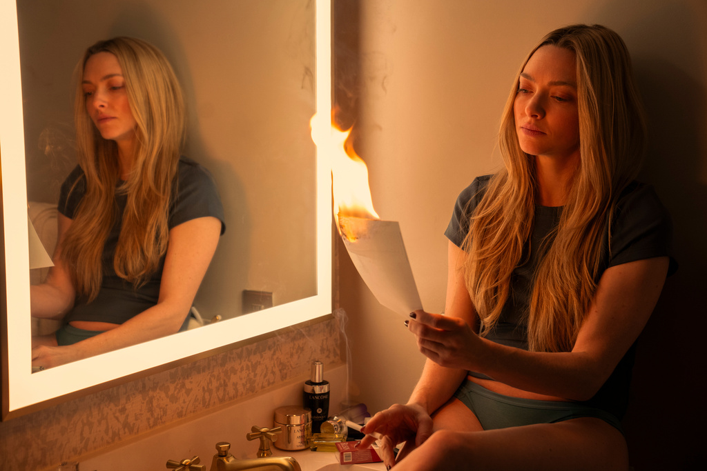 This image released by Lionsgate shows Amanda Seyfried in a scene from "The Housemaid." (Lionsgate via AP)