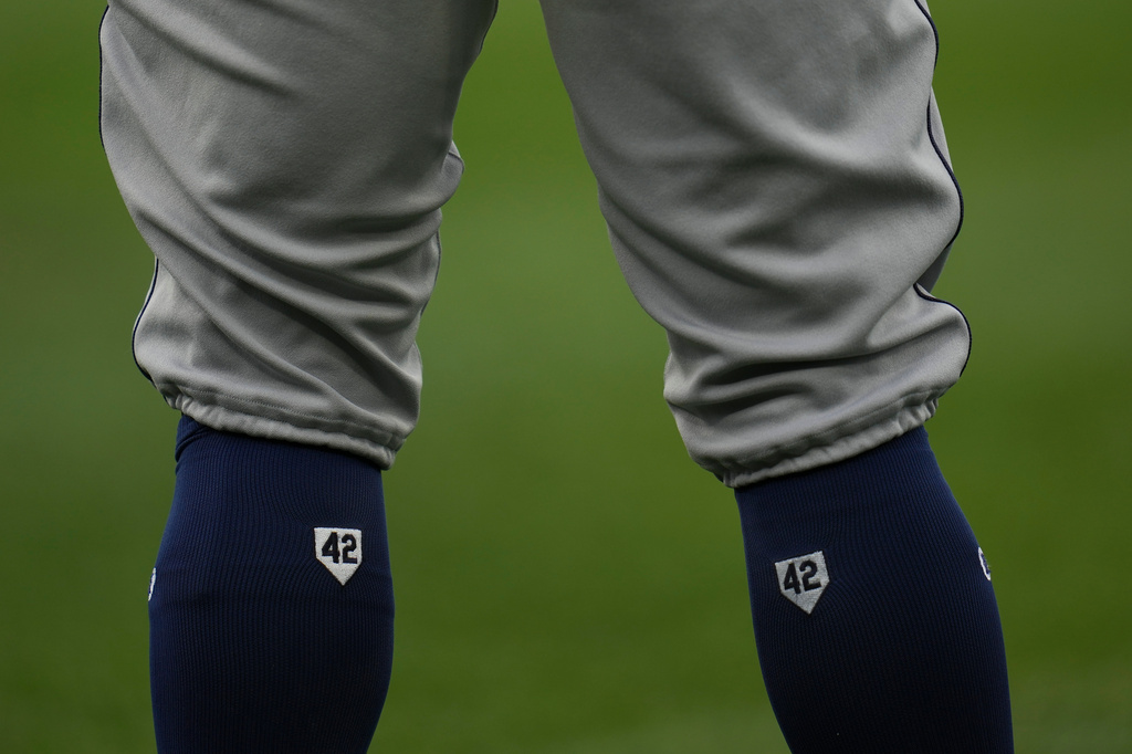 Tampa Bay Rays' Jonathan Aranda socks with number 42 for Jackie Robinson Day before a baseball game against the Chicago White Sox, Wednesday, April 15, 2026, in Chicago. (AP Photo/Erin Hooley)