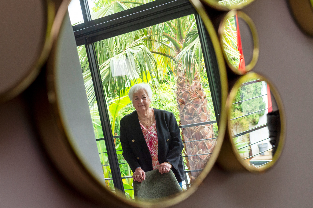 Marie-Therese Ross-Mahe, an 85-year-old French widow of a U.S. military veteran, poses in Orvault, western France, during an interview with The Associated Press, Monday, May 11, 2026. (AP Photo/Mathieu Pattier)