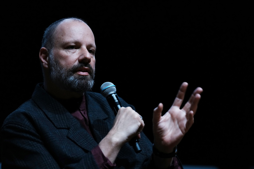 Oscar nominated director Yorgos Lanthimos speaks to reporters at the inauguration of an exhibition of his photographs at Onassis Stegi in Athens, Greece, on Friday, March 6, 2026. (AP Photo/Thanassis Stavrakis)
