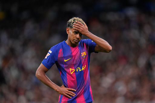 Barcelona's Lamine Yamal gestures during the Spanish La Liga soccer match between Real Madrid and Barcelona, in Madrid, Sunday, Oct. 26, 2025. (AP Photo/Manu Fernandez) Barcelona's Lamine Yamal gestures during the Spanish La Liga soccer match between Real Madrid and Barcelona, in Madrid, Sunday, Oct. 26, 2025. (AP Photo/Manu Fernandez)