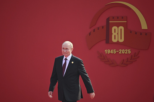 Russian President Vladimir Putin arrives at a military parade to commemorate the 80th anniversary of Japan's World War II surrender in Beijing, China, Wednesday, Sept. 3, 2025. (Sergei Bobylev, Sputnik, Kremlin Pool Photo via AP) Russian President Vladimir Putin arrives at a military parade to commemorate the 80th anniversary of Japan's World War II surrender in Beijing, China, Wednesday, Sept. 3, 2025. (Sergei Bobylev, Sputnik, Kremlin Pool Photo via AP)