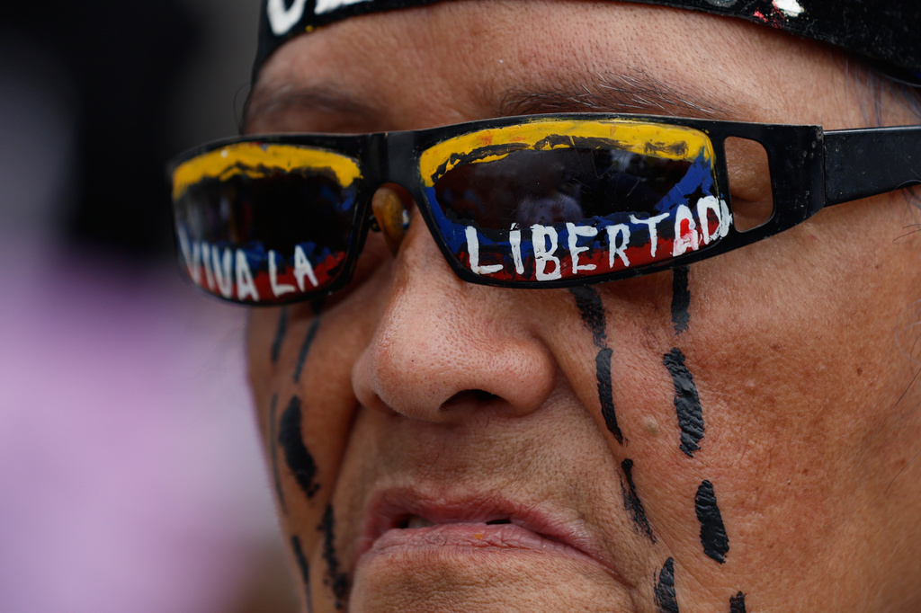 Trade union members march to demand that the government announce a timetable for presidential elections in Caracas, Venezuela, Wednesday, July 8, 2026. 2026. (AP Photo/Pedro Mattey)