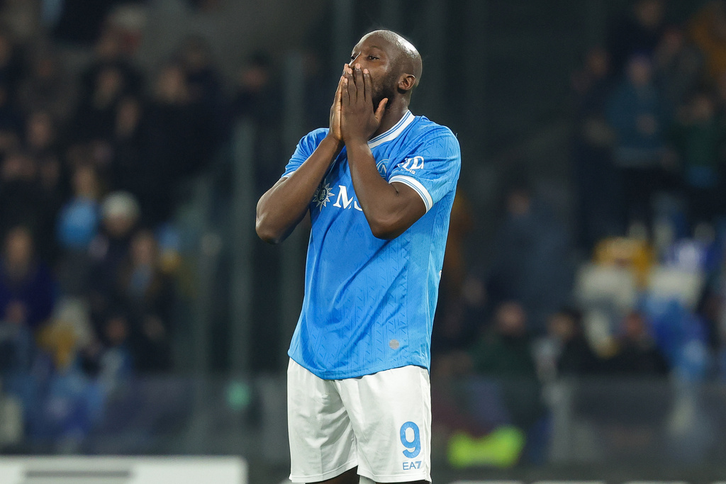 Napoli's Romelu Lukaku reacts after missing a penalty kick during a shoot out against Como in a Italian Cup quarterfinal soccer match, Tuesday, Feb. 10, 2026, in Naples, Italy. (Alessandro Garofalo/LaPresse via AP)