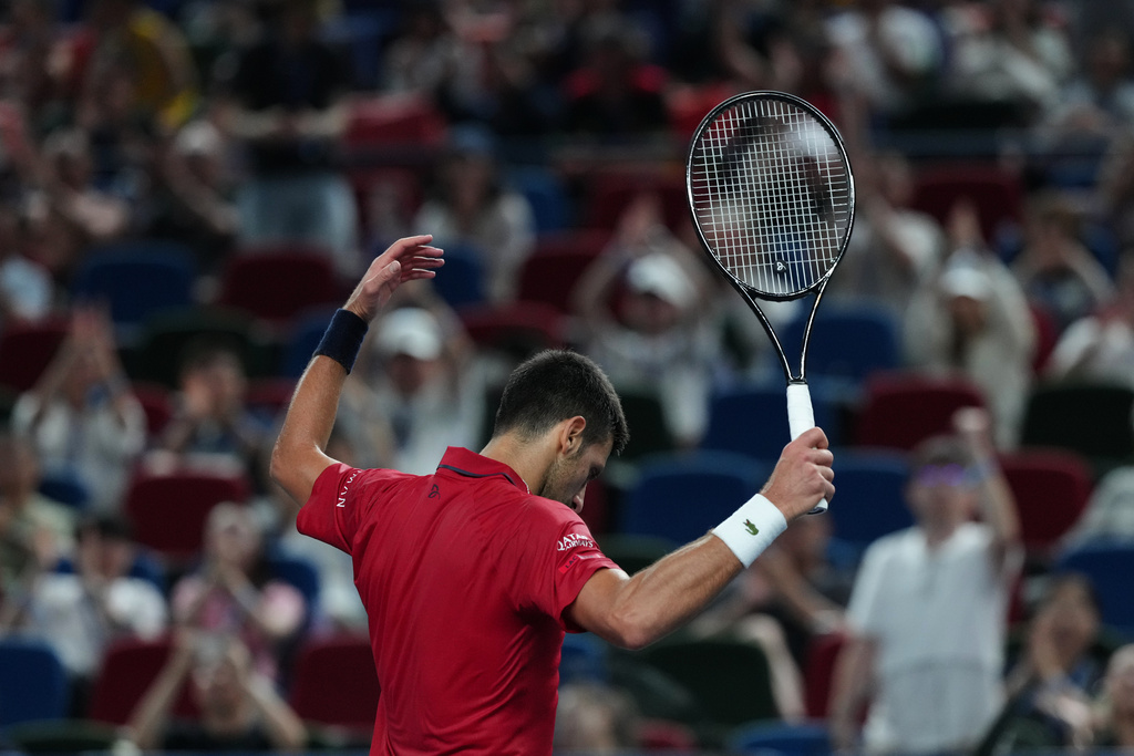 Novak Djokovic of Serbia cheers after scoring a break point against Zizou Bergs of Belgium during the men's singles quarterfinal match of the Shanghai Masters tennis tournament at Qizhong Forest Sports City Tennis Center, in Shanghai, China, Thursday, Oct. 9, 2025. (AP Photo/Andy Wong)