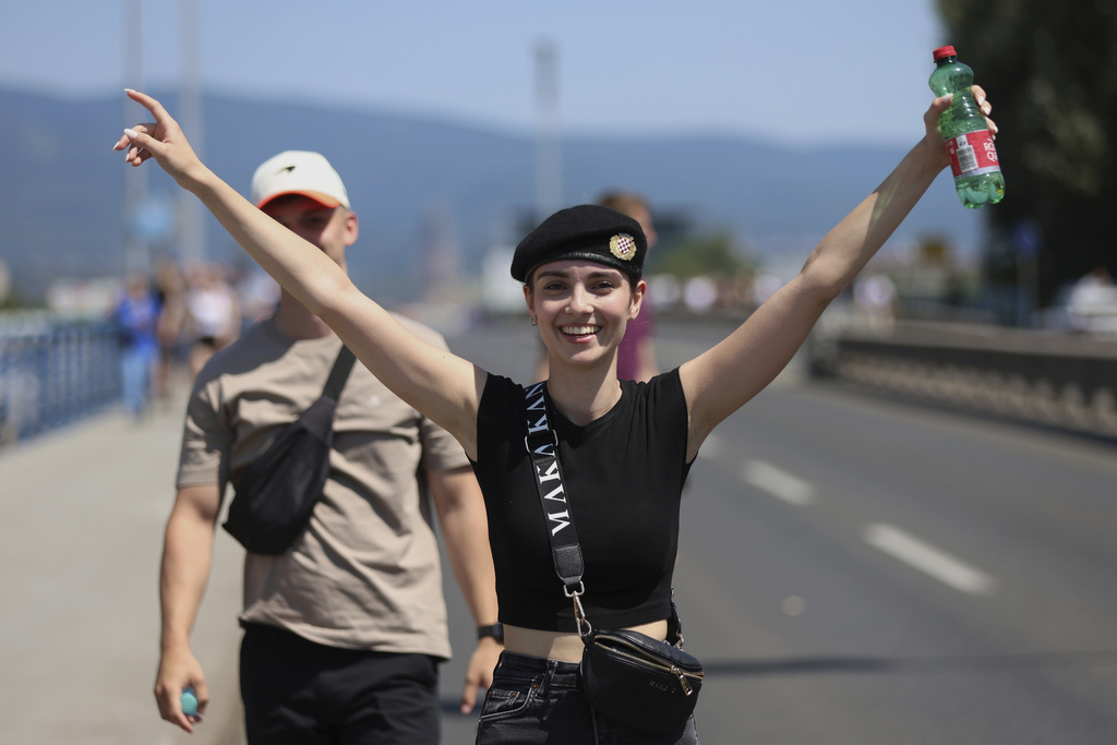 Fans arrive for the concert of right-wing singer Marko Perkovic, known as Thompson in Zagreb, Croatia, Saturday, July 5, 2025. (AP Photo)