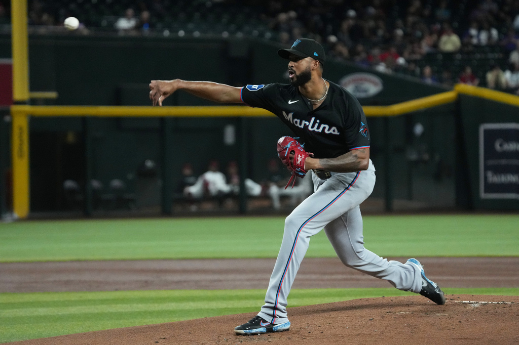 Miami Marlins pitcher Sandy Alcantara throws against the Arizona Diamondbacks in the first inning of a baseball game, Monday, Sept 14, 2026, in Phoenix. (AP Photo/Rick Scuteri)
