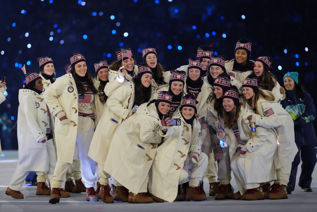 Team USA takes a group photo during the Olympic opening ceremony at the 2026 Winter Olympics, in Milan, Italy, Friday, Feb. 6, 2026. (AP Photo/Natacha Pisarenko)