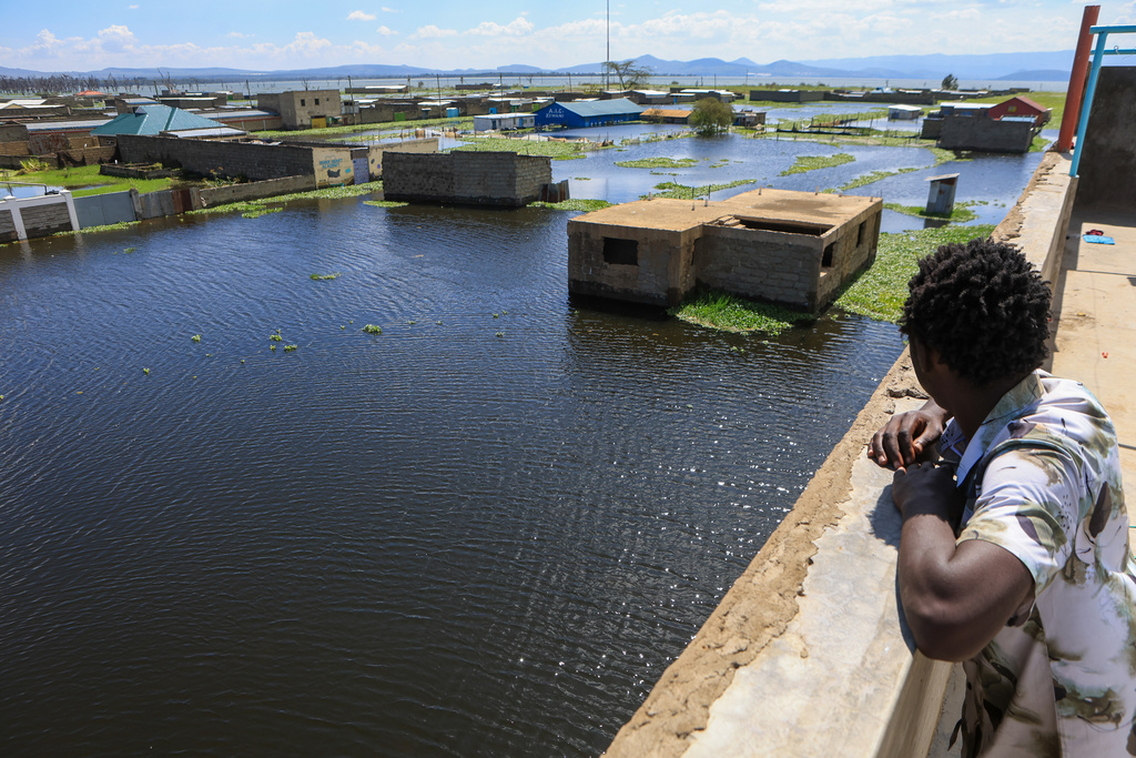Residential buildings are submerged after Lake Naivasha swelled and flooded homes, in Kihoto Village, in Naivasha, Kenya's Rift Valley region, Tuesday, Nov. 11, 2025. (AP Photo/Andrew Kasuku)
