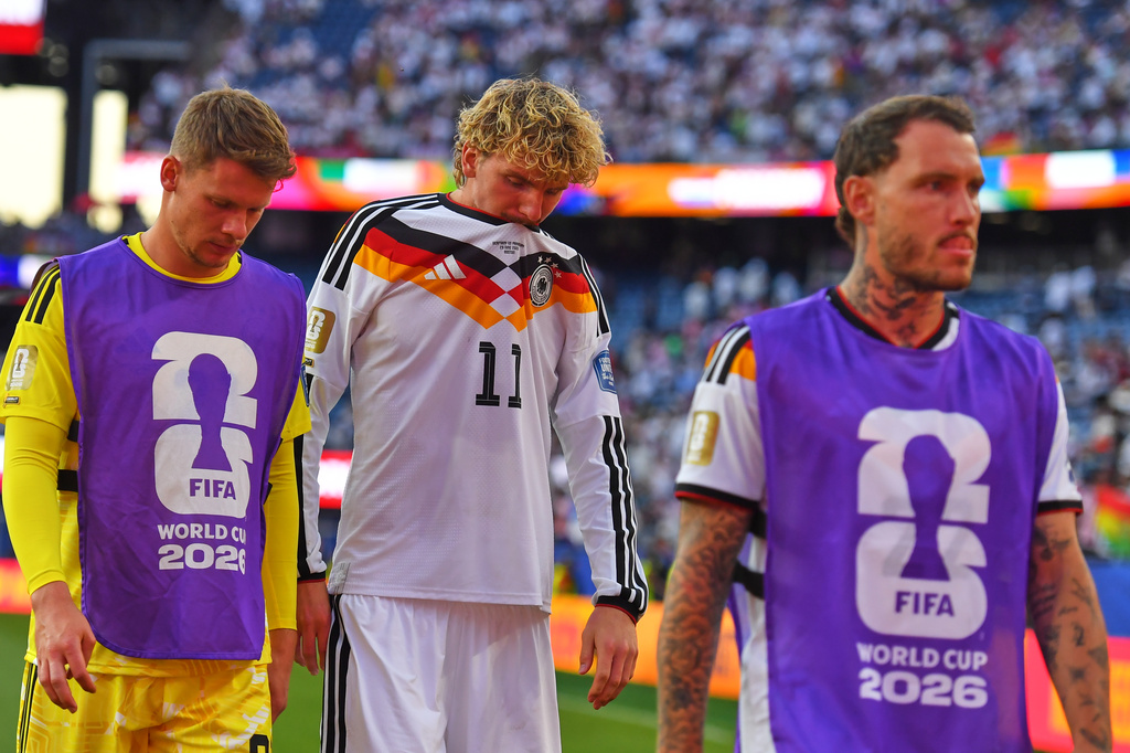 Germany's Nick Woltemade (11) walks off the field after losing to Paraguay in a shootout during the World Cup round of 32 soccer match in Foxborough, Mass., near Boston, Monday, June 29, 2026. (AP Photo/Steven Senne)