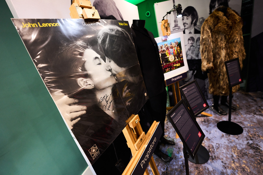 Autographed poster for the album 'Double Fantasy', signed by John Lennon on the morning of the day he died Dec. 8, 1980, on display during 'Music Memorabilia: Strikes A Chord' exhibition in London, England, Wednesday, April 22, 2026. (Photo by Scott A Garfitt/Invision/AP)