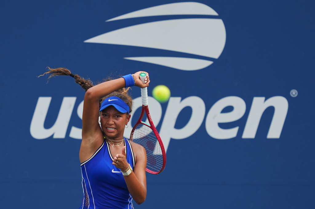 Thea Frodin, of the United States, returns the ball to Elena Rybakina, of Kazakhstan, during the first round of the U.S. Open tennis championships Tuesday, Sept. 1, 2026, in New York. (AP Photo/Kirsty Wigglesworth)