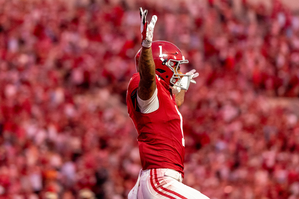 Alabama wide receiver Ryan Coleman-Williams (1) celebrates after a 57-yard touchdown run by quarterback Keelon Russell during the second half of an NCAA college football game against Florida State Saturday, Sept. 19, 2026, in Tuscaloosa, Ala. (AP Photo/Vasha Hunt)