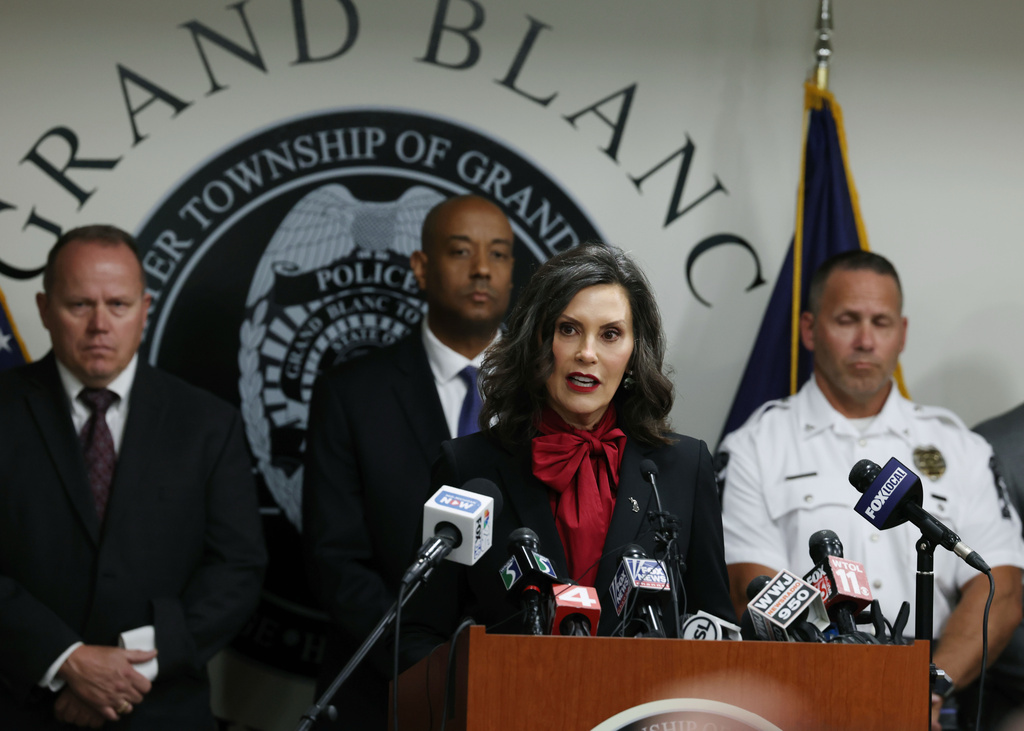 Michigan Gov. Gretchen Whitmer addresses the media, regarding the shooting at the Church of Jesus Christ of Latter-day Saints, during a news conference at the Grand Blanc Township police, Monday, Sept. 29, 2025 in Grand Blanc Township, Mich. (AP Photo/Carlos Osorio)