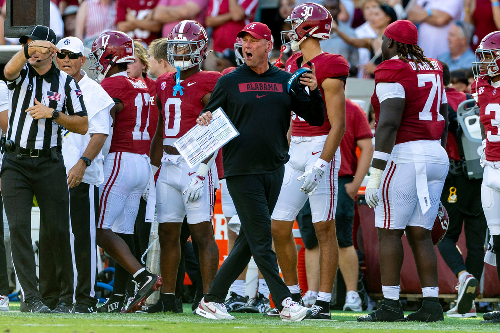 Alabama head coach Kalen DeBoer reacts to a targeting call reversal during the first half of an NCAA college football game against Vanderbilt, Saturday, Oct. 4, 2025, in Tuscaloosa, Ala. (AP Photo/Vasha Hunt)