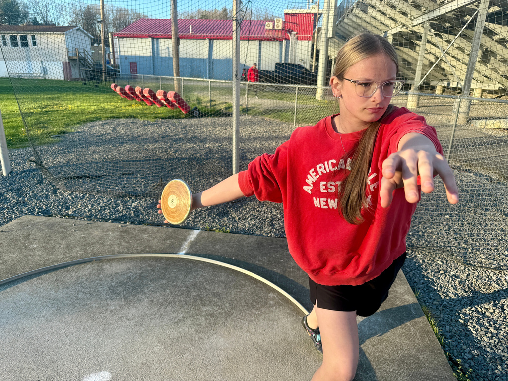 Becky Pepper-Jackson is shown practice throwing the discus Tuesday, April 7, 2026, at Bridgeport High School in Bridgeport, W.VA. (AP Photo/John Raby)